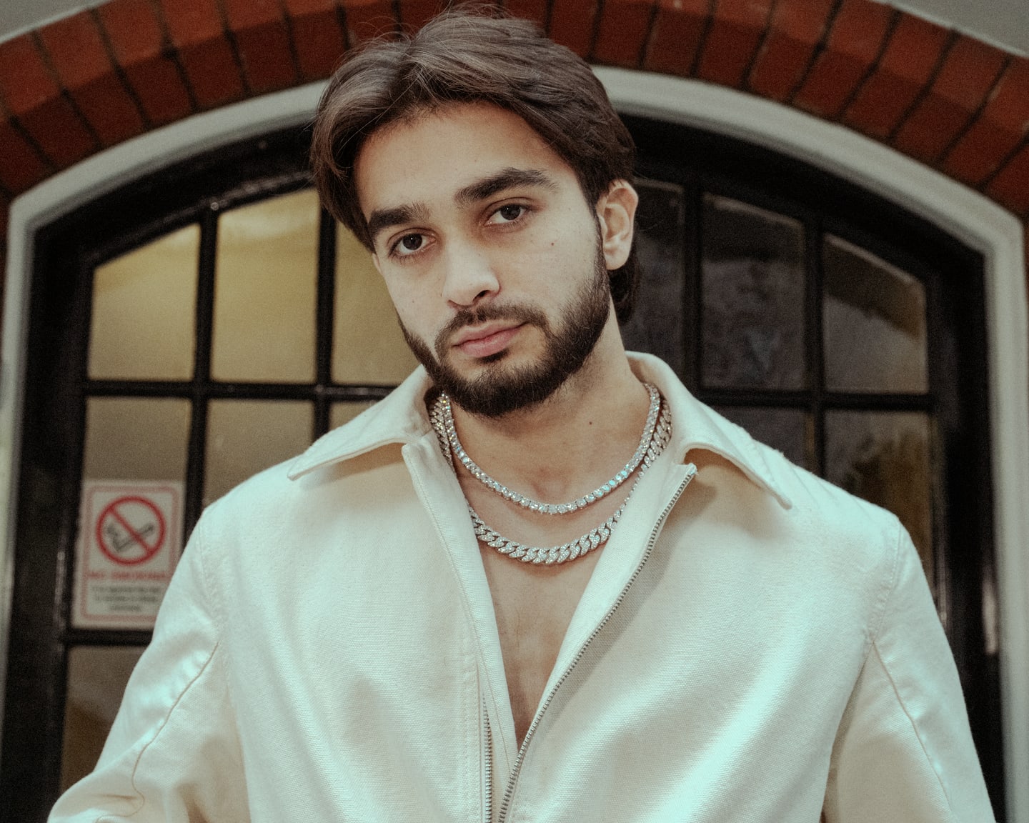 Editorial fashion portrait in cream styling